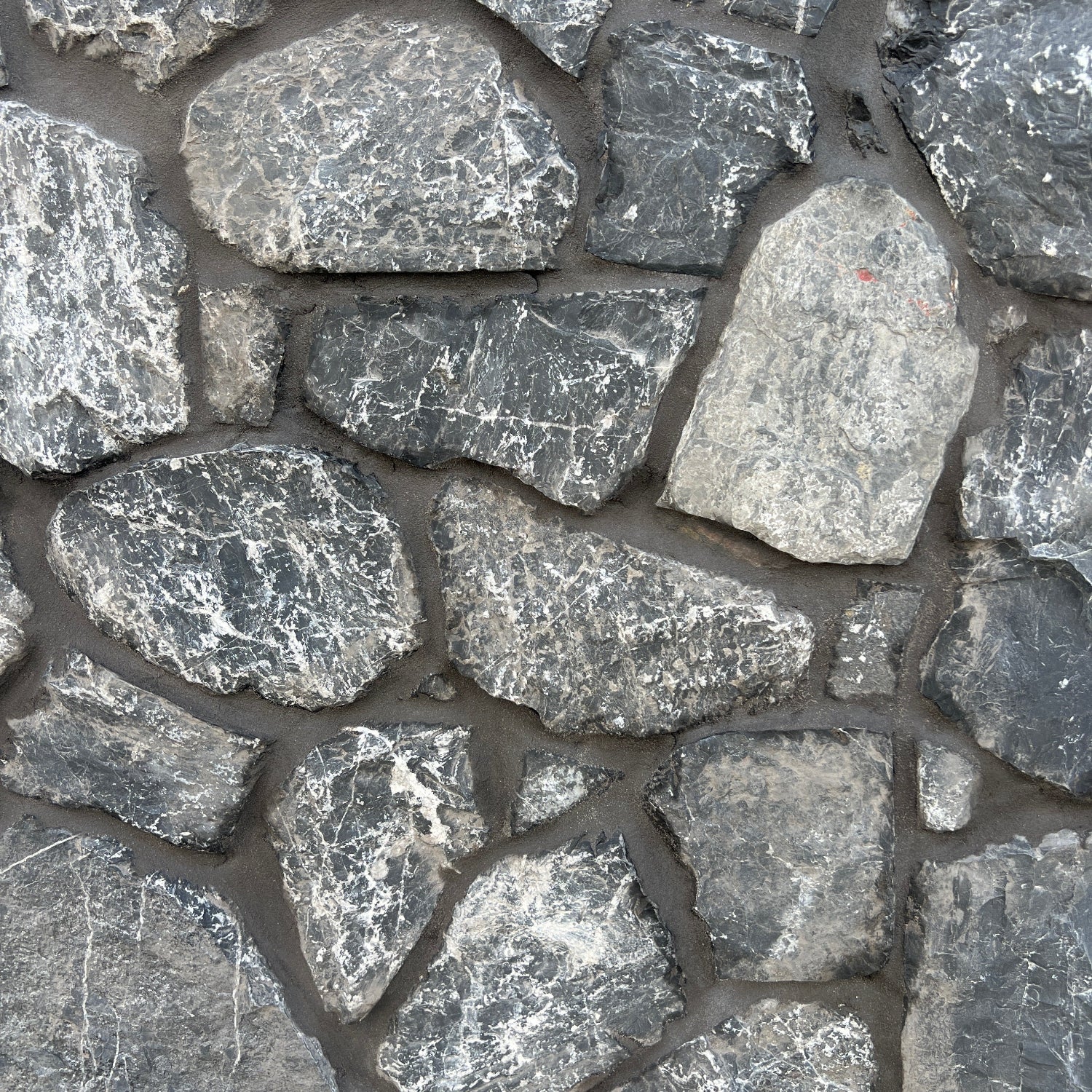 dark slate random freeform natural Stone Cladding for building, home decoration, renovations, interior & exterior walls, garden features and feature walls.