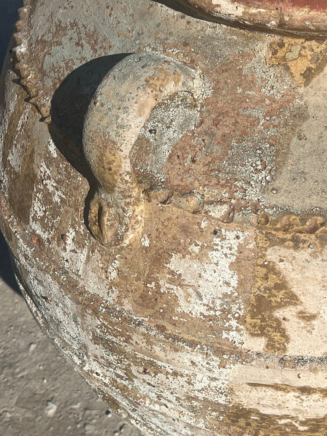 Ancient Ribbed Belly Urn with Handles and warn patina and close up of handles
