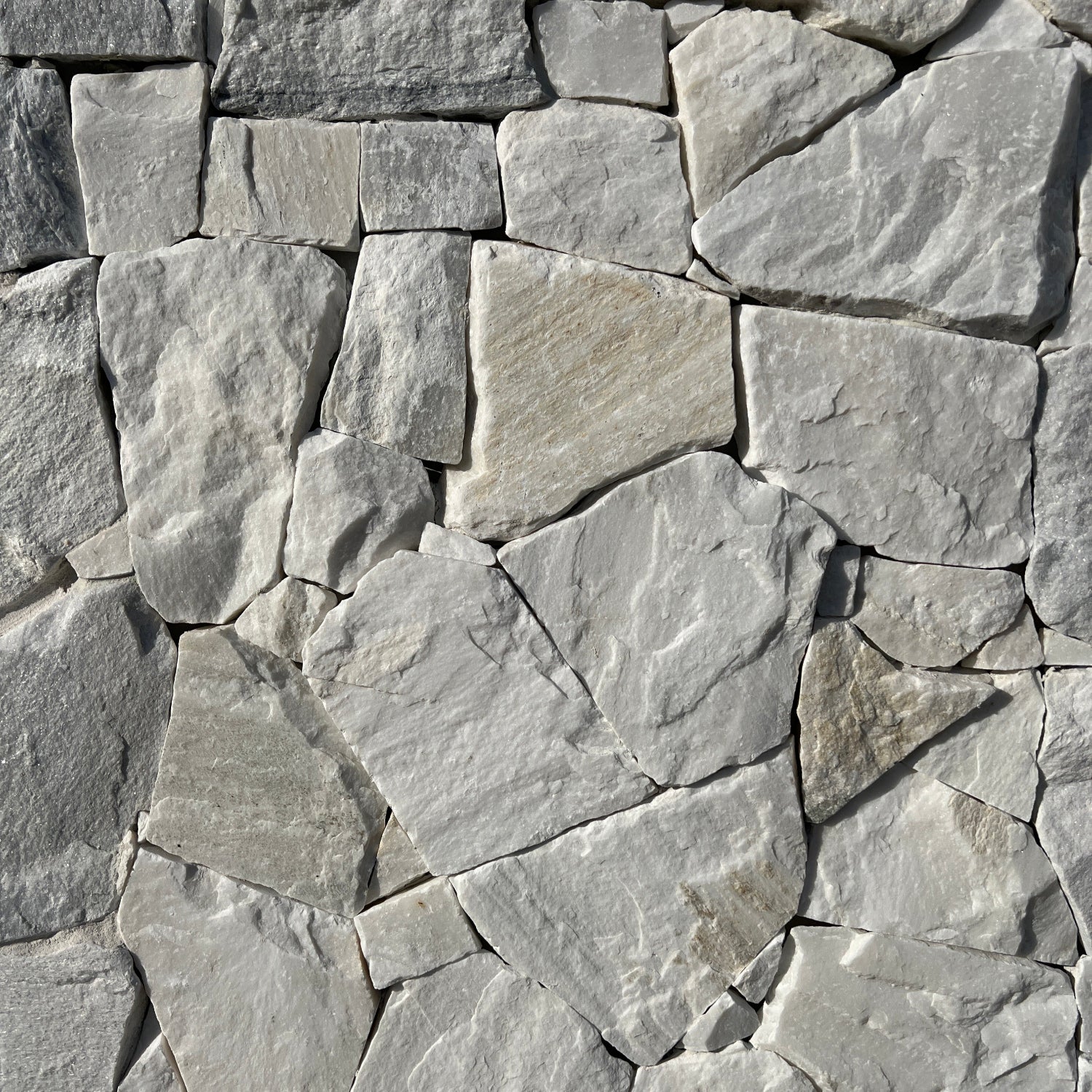 White Quartz random freeform natural Stone Cladding for building, home decoration, renovations, interior & exterior walls, garden features and feature walls.