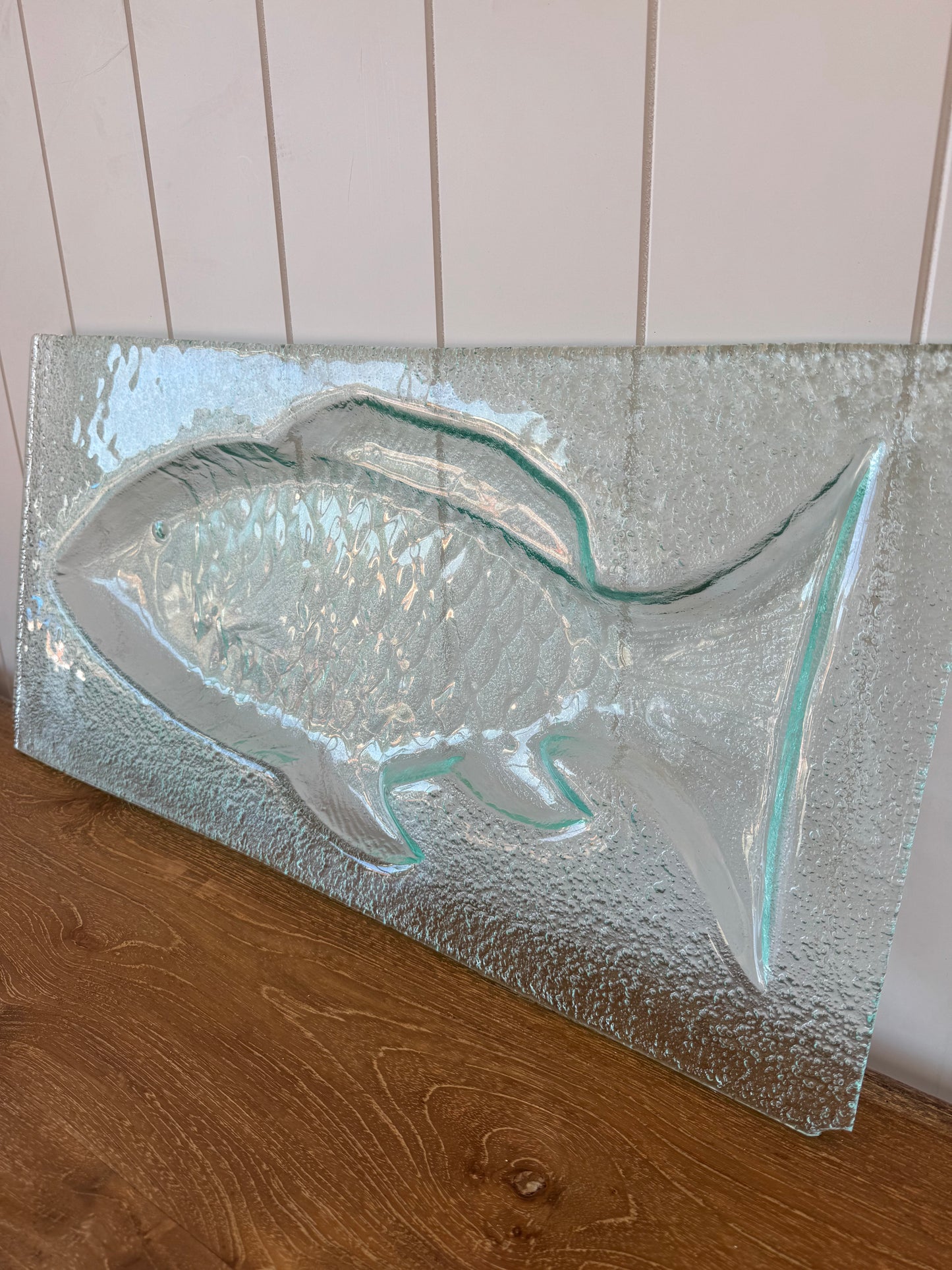 Fish-shaped glass bowl ideal for serving snacks, salads, or as a decorative piece.