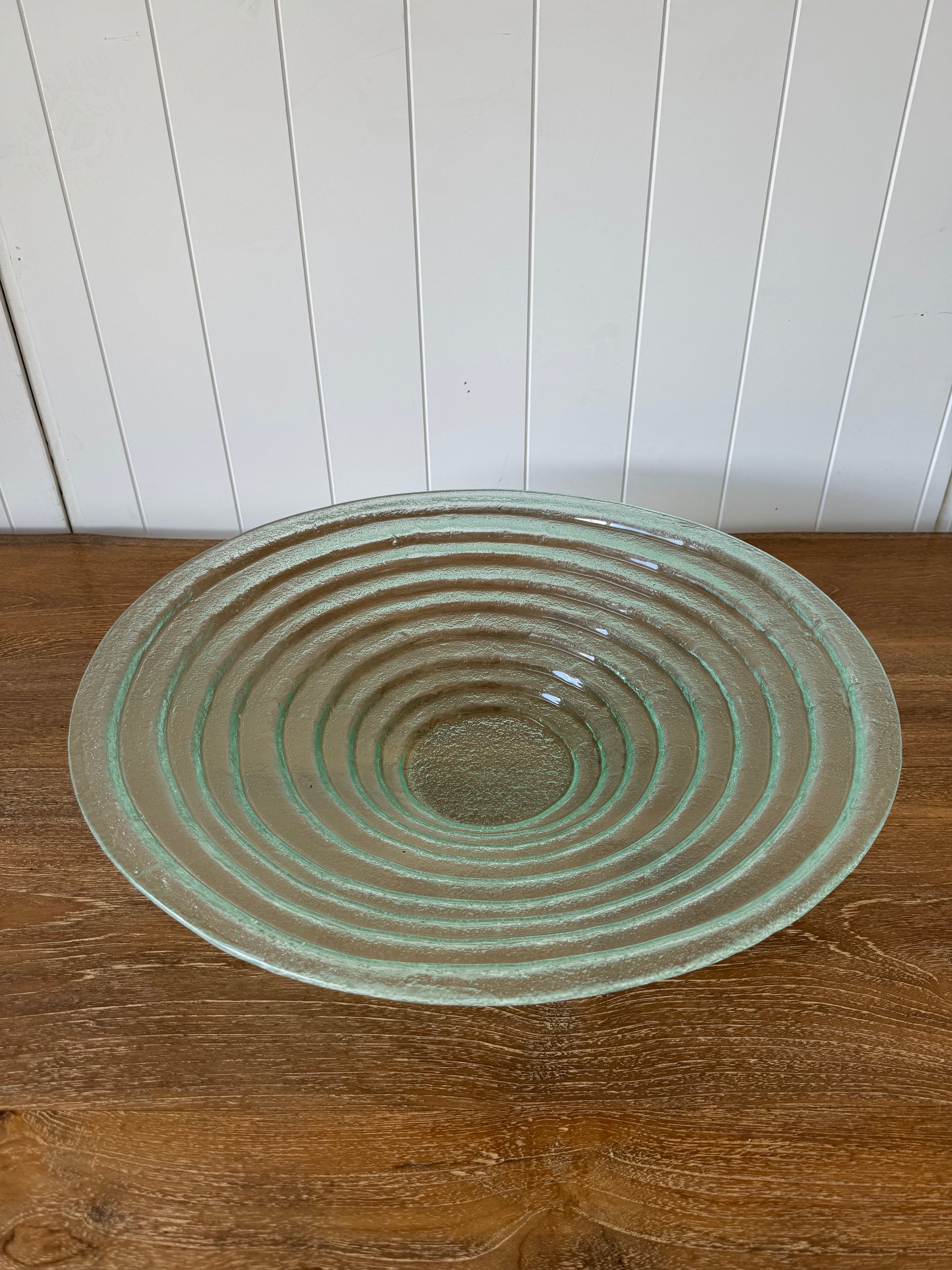 Round glass bowl suitable for serving dips or using as a planter.