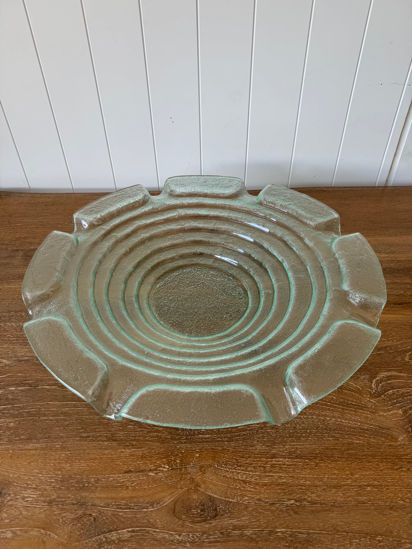 Round glass bowl suitable for serving dips or using as a planter.