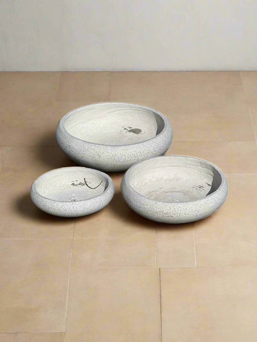 fibre glass terrazzo garden bowls in three sizes on a tiled floor indoors