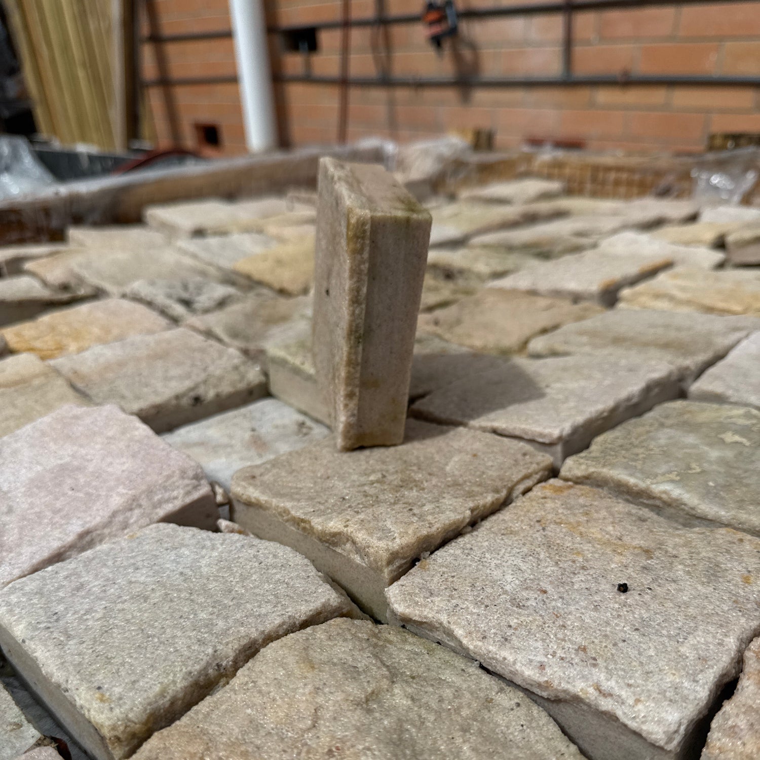 beautiful, elegant natural white sandstone cobblestones side view