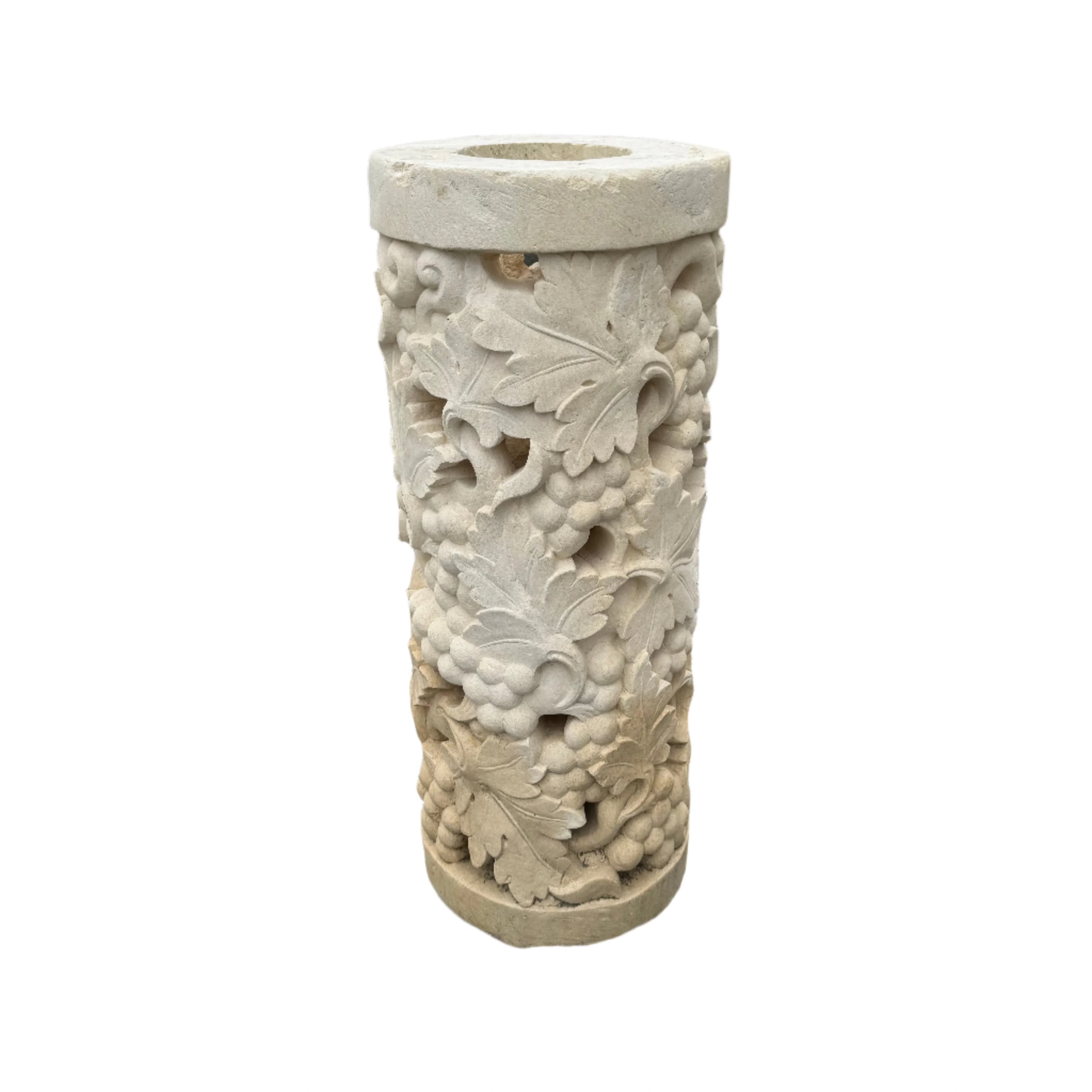 natural organic limestone pillar with ornate fruit sculpture carvings