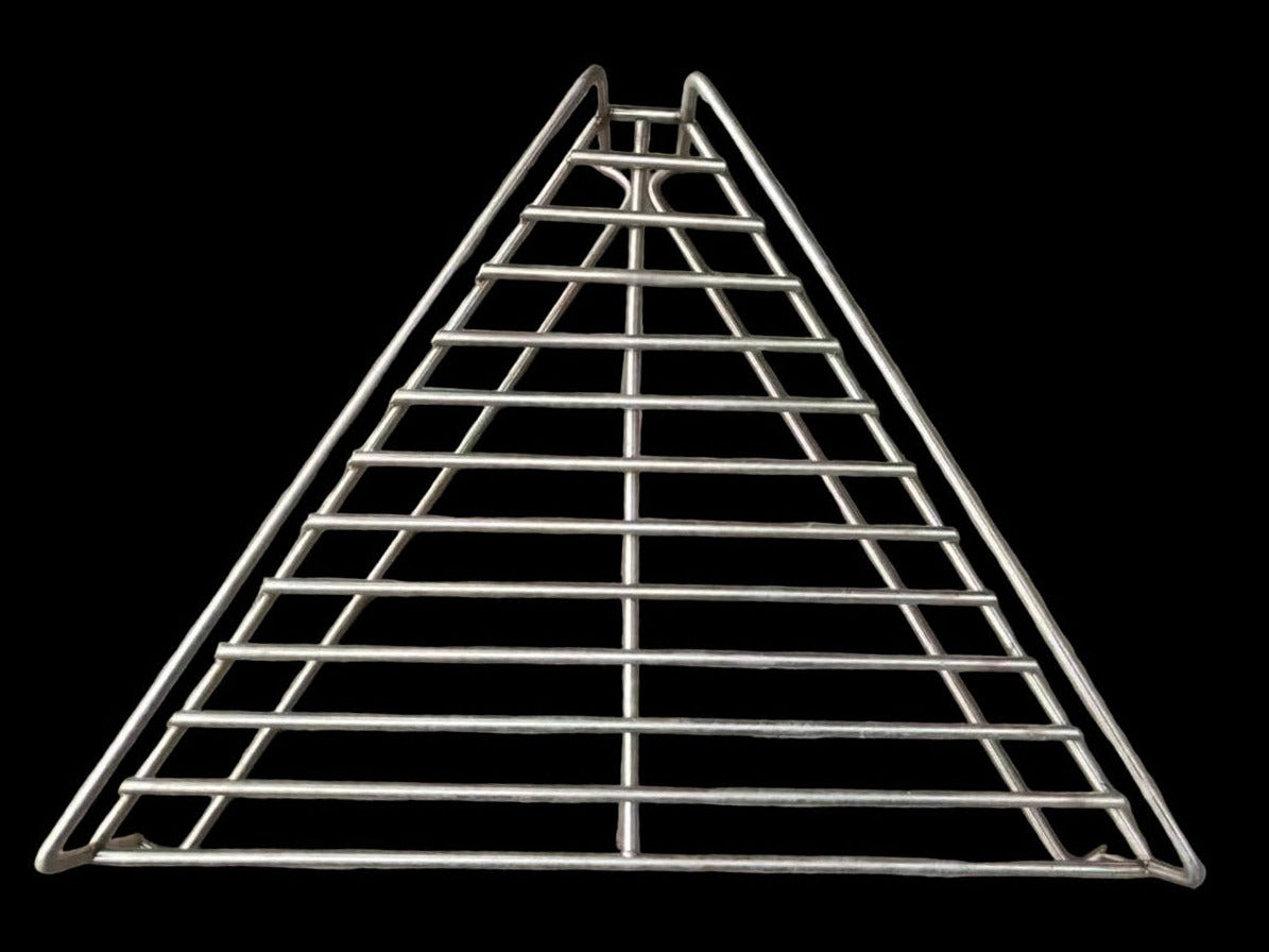 Stainless steel wood cradle / fire grate inside The Abraxas 150 chimney - holds the firewood off the base