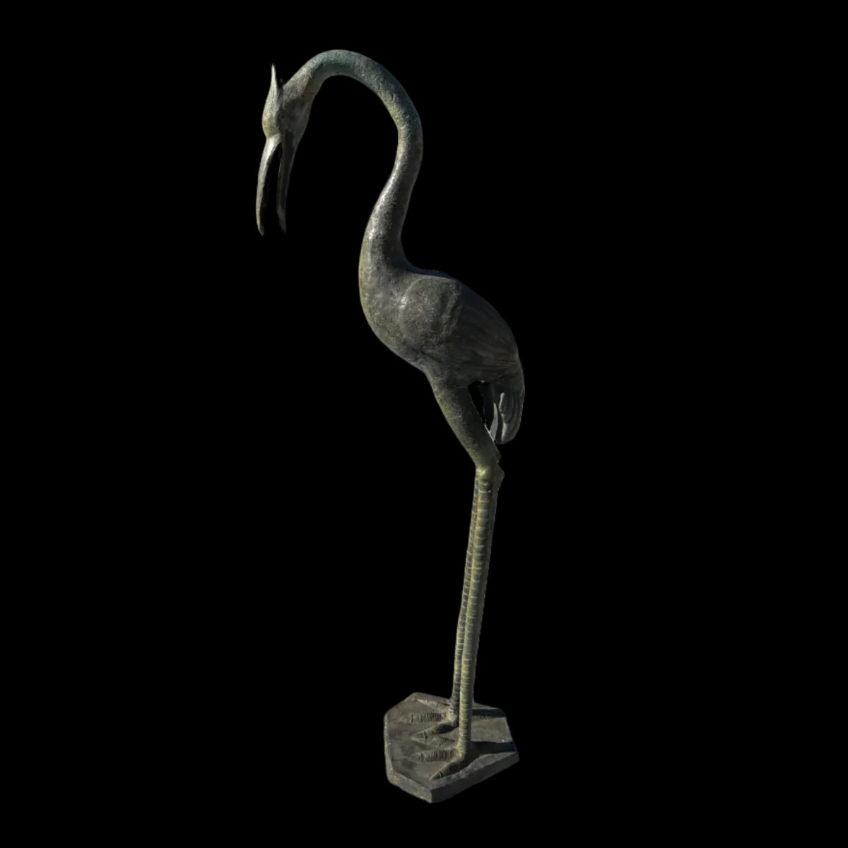 an intricately handmade tall metal garden statue of a stalk bird standing up straight with its head bent looking down