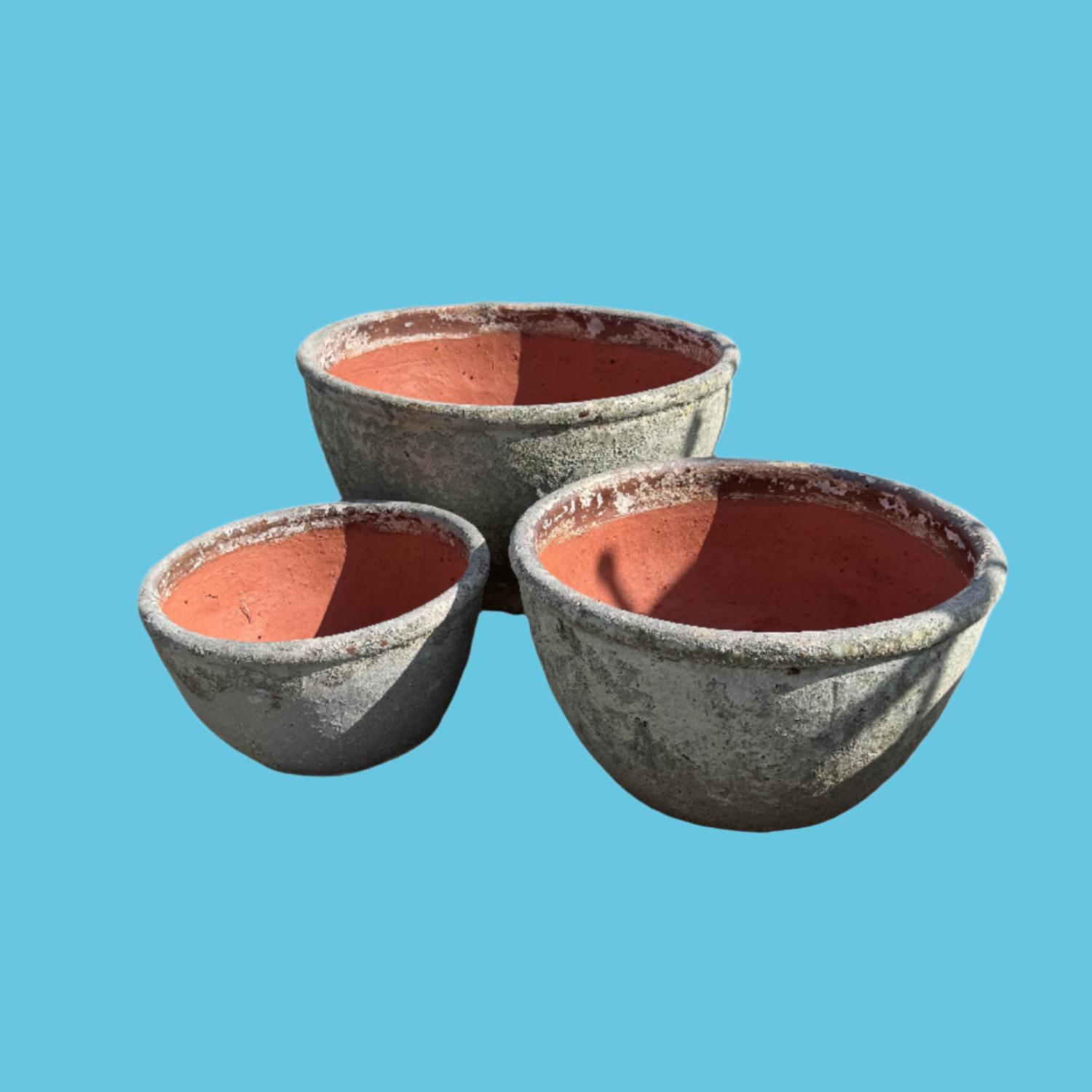 Extra Large lava rock Atlantis succulent garden bowls in three sizes with a blue background