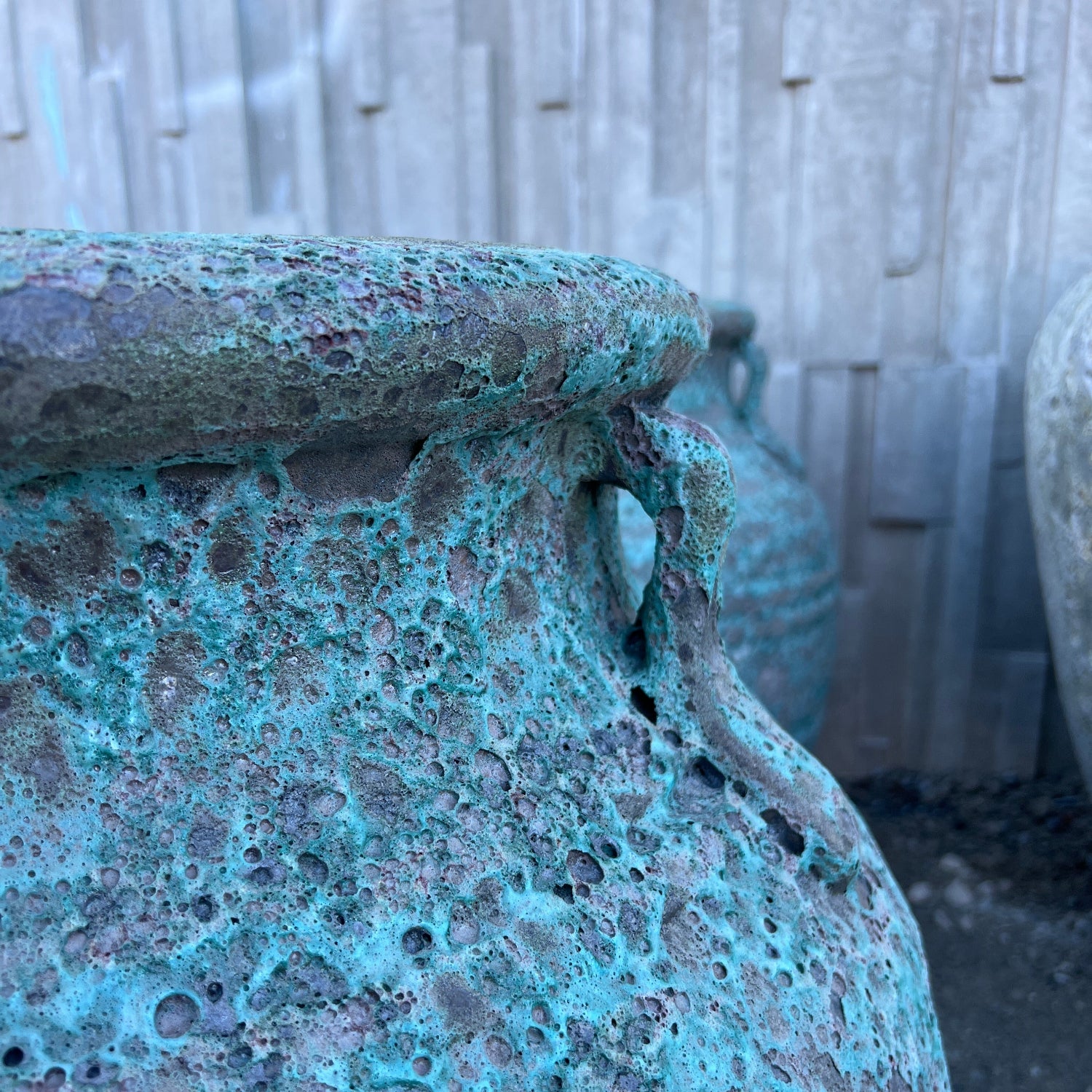 Green Lava Rock Atlantis Garden Urn close up of handles