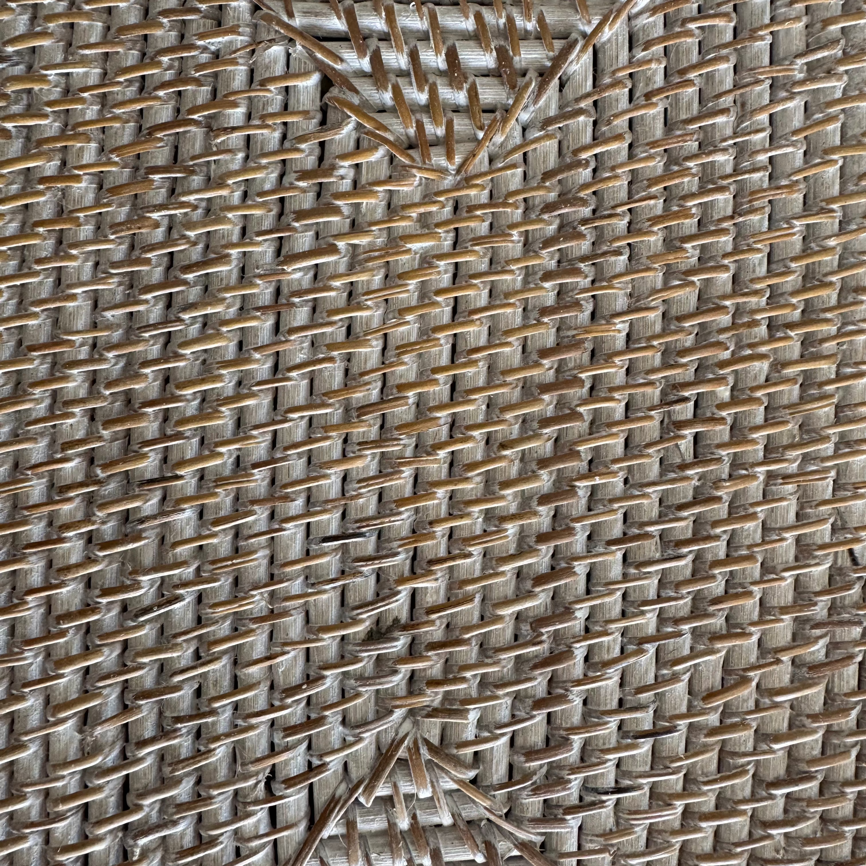 Rectangular Rattan dining table placemat with cowrie shell border rattan close up