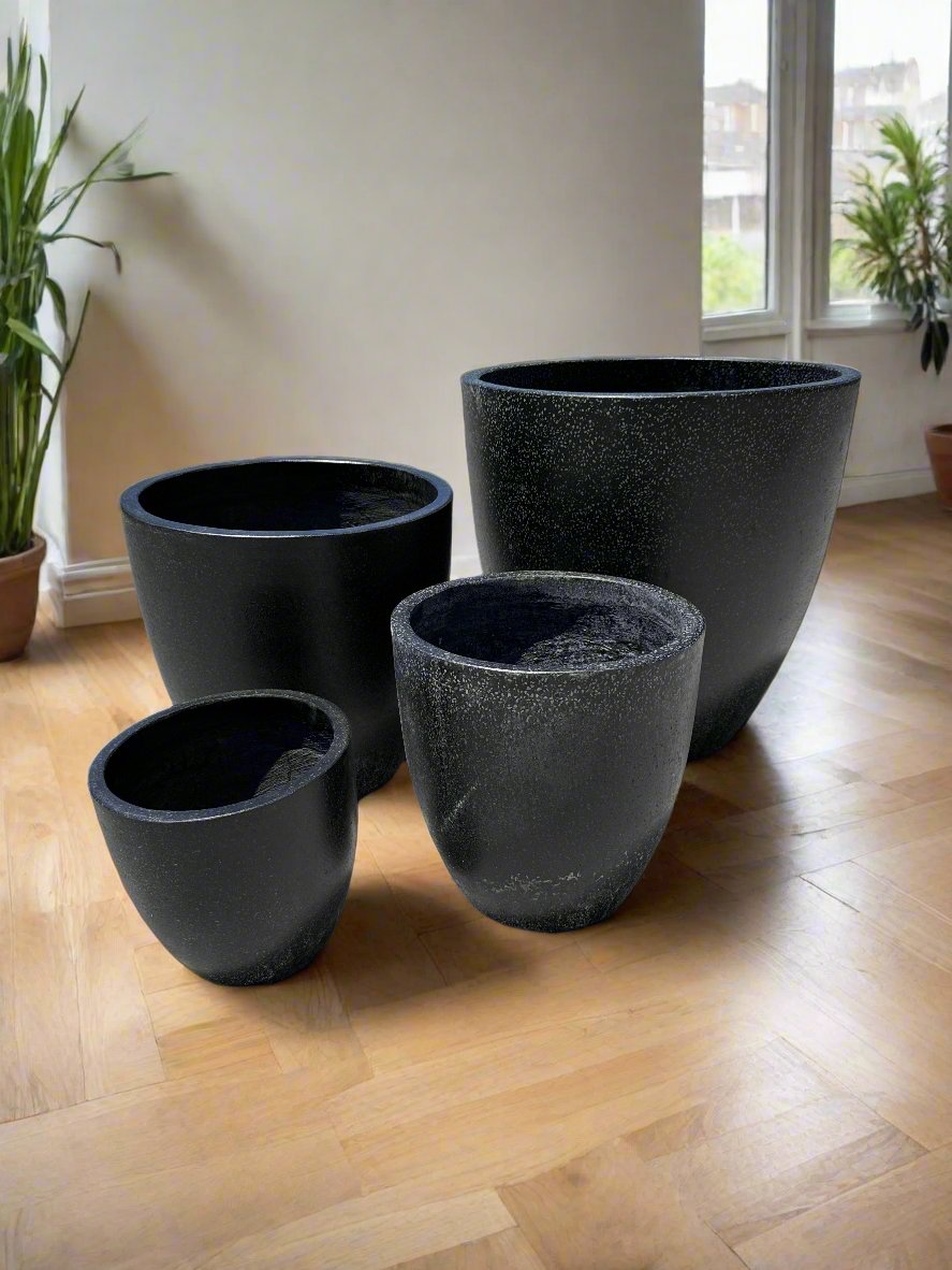 black fibre glass terrazzo cone pots in four different sizes great for inside apartments for easy moving. 