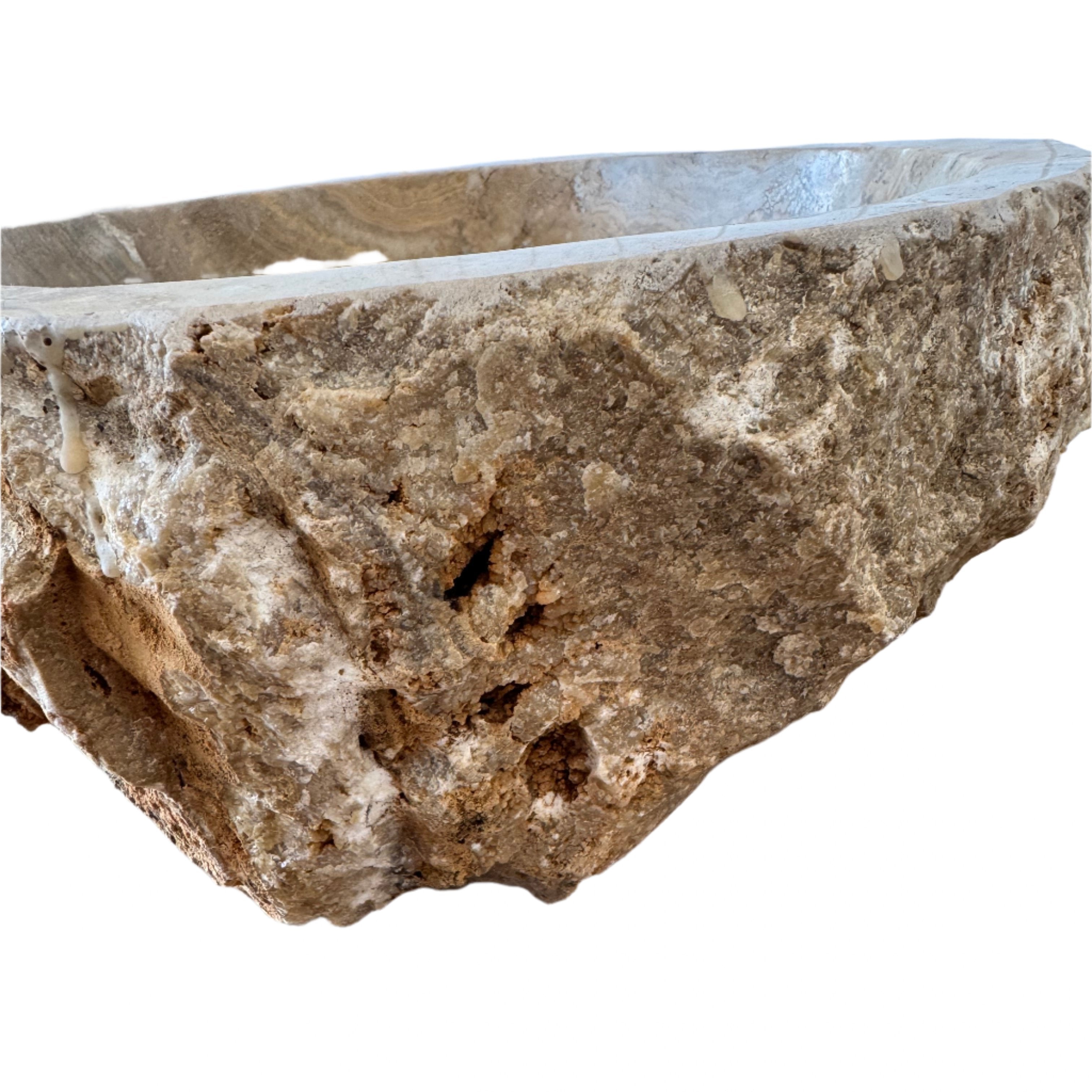 natural organic Travertine stone basin close up of the stunning quartz