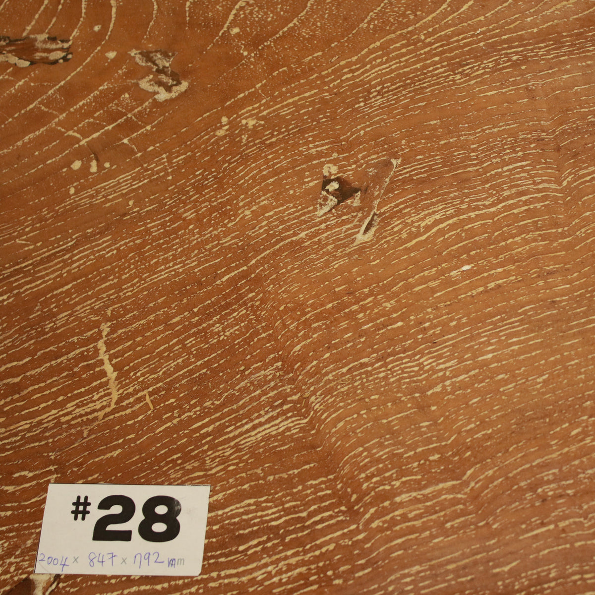 close up of the suar wood timber table 28's wood grain